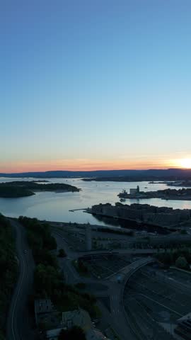 Beautiful Sunset over City Bridge and River Aerial View