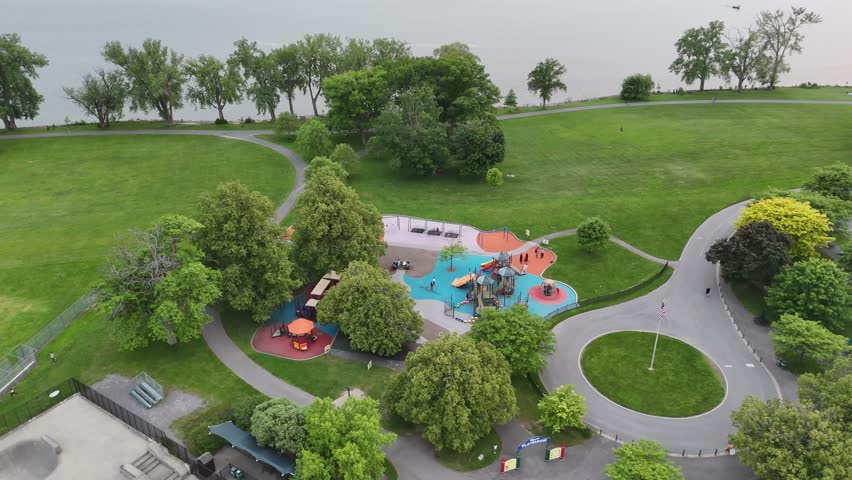 People engaging in and enjoying the amenities that this public park has to offer as it