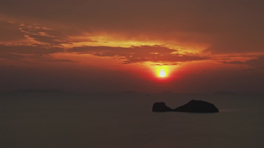 Tropical island on horizon in sunset time. Koh Samui. Thailand.    