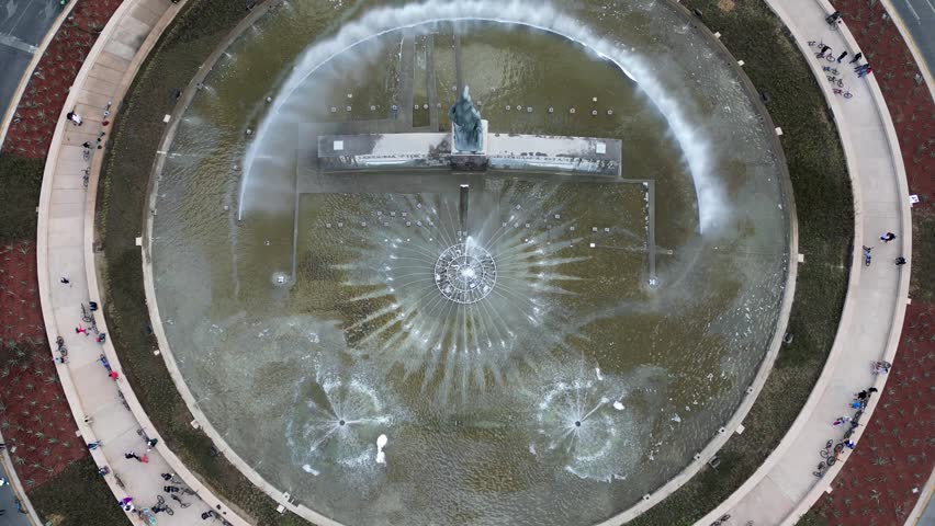 Drone aerial view of the iconic Minerva Roundabout, a famous landmark in Guadalajara, Jalisco, featuring its impressive fountain and statue.