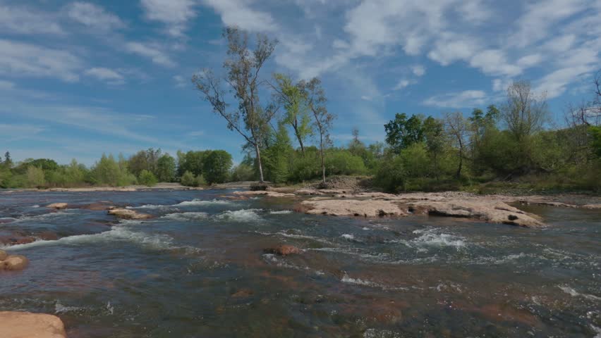 American River rapids flowing past rocks