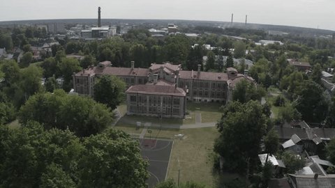 Drone Rotating around Historic Architecture Trees
