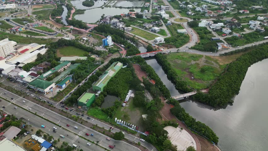 Diversion Road And Iloilo River With Dungon Creek In Iloilo City, Philippines. Aerial Drone Shot