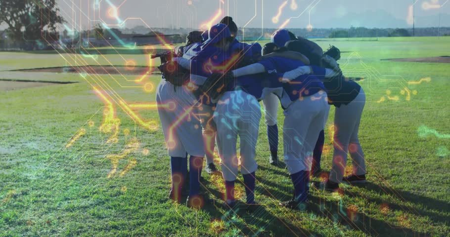 Female softball players forming pregame huddle on field while circuit overlay shifting over caps. Circle, unity, team, outdoor, grass, sunlit, focus