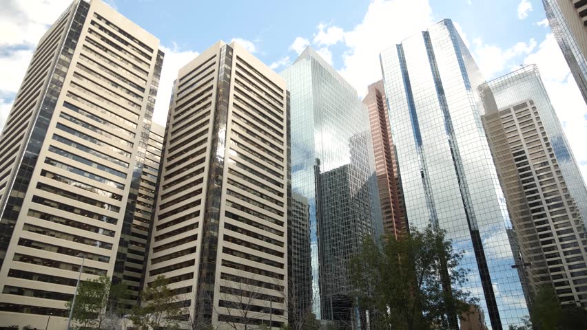 Calgary downtown with panorama of the city of skyscrapers. Calgary Plus 15 Skywalk system with pedestrians in downtown business district. Road trip in Canada. 