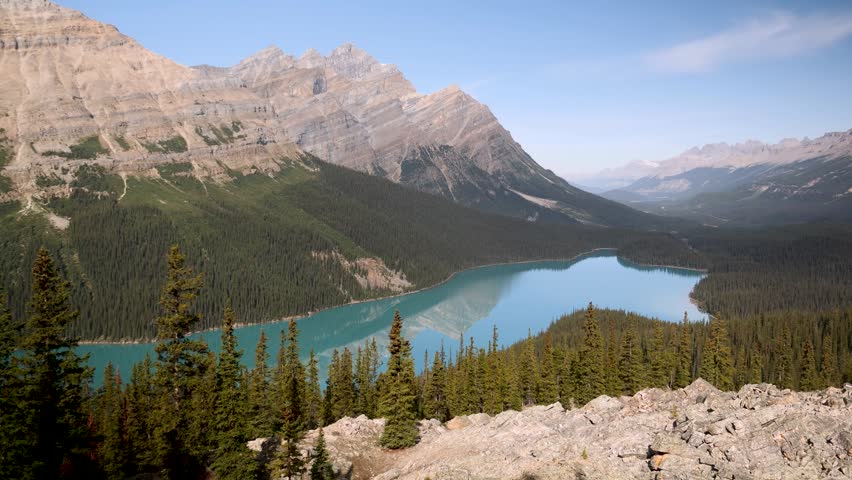 Majestic Peyto lake and mountain peaks, glaciers, turquoise lake in Jasper National Parks, Alberta, Canada. Road trip in Canada. Rocky mountains. 4k footage