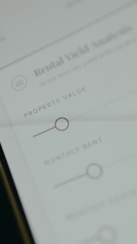 Person using the input slider for Property Value, Rental Yield Analysis