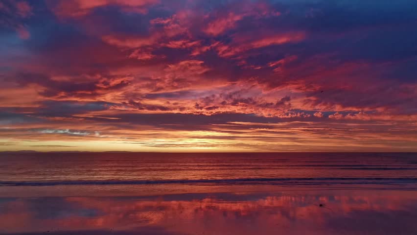 A magnificent sunrise over the Indian Ocean in Struisbaai, South Africa.