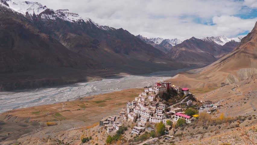 Beautiful landscape of Key monastery against Himalaya mountains and Spiti river in background at Kaza, Spiti Valley, India. Summer travel concept. Tibetan Buddhist monastery in Spiti Valley.