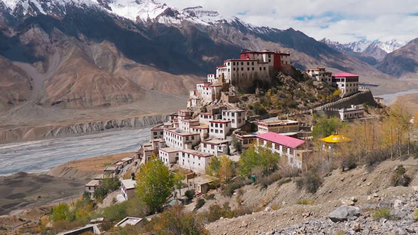 Key Monastery in background of Himalaya mountains and Spiti river during summer at Kaza, Spiti Valley, Himachal Pradesh, India. Ancient Buddhist monastery in India.