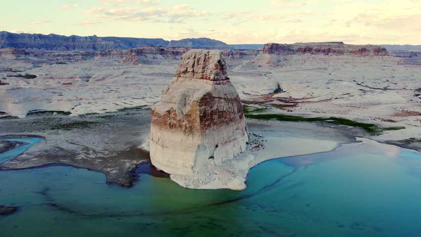 Cinematic view of Lone Rock in Lake Powell, Colorado River landmark in Utah.