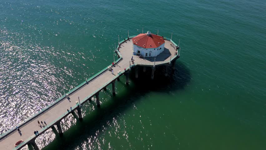 Aerial view of Manhattan Beach pier with round building over ocean, March 10, 2026