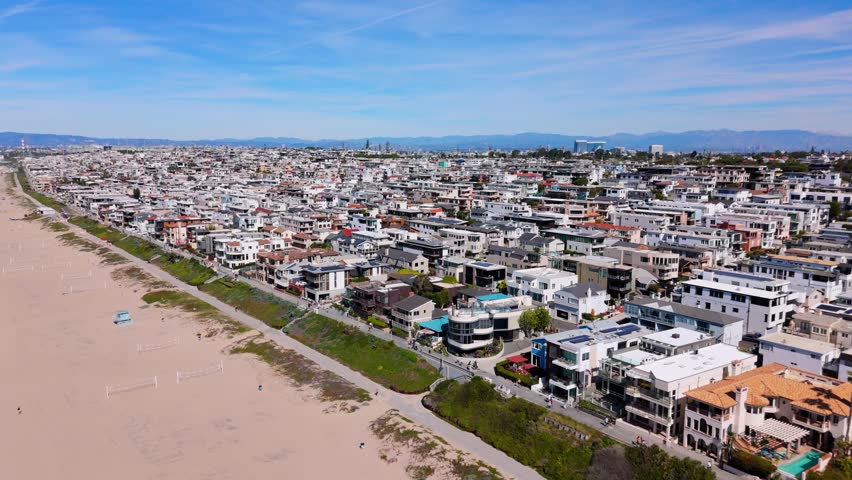 Aerial drone flying over coastal residential neighborhood in Los Angeles