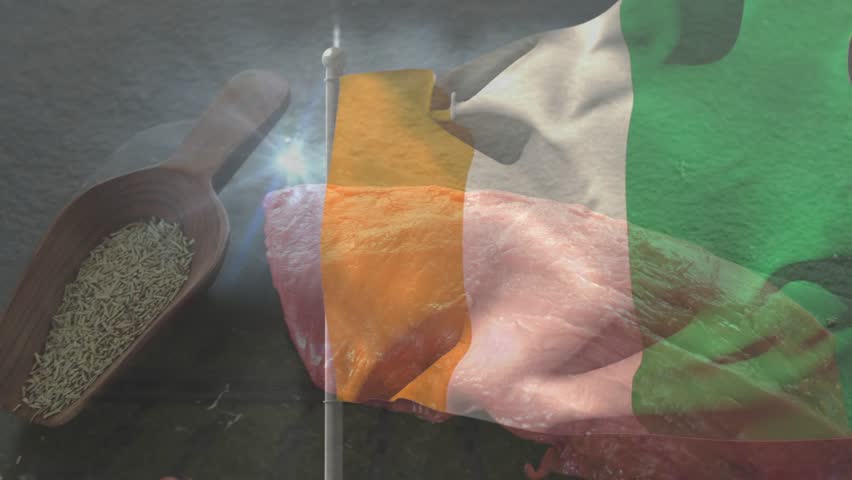 Tricolor flag overlay rippling over meat, grains and garlic on slate, on play activating food promo. Banner, multicolor, studio, ingredients, rice, clove, glossy