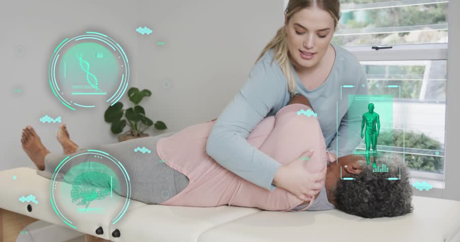 Clinician placing hands and guiding rotation for therapy, while green AR scan aligning to torso. Clinic, rehab, holographic, augmented, visualization, digital, sunlit