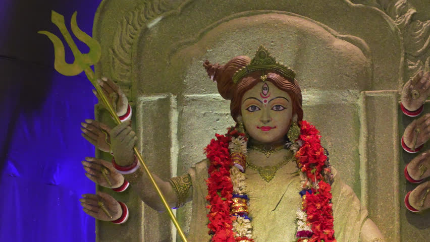 Goddess Durga idol depicted as a queen in India, showing royal posture, powerful expression