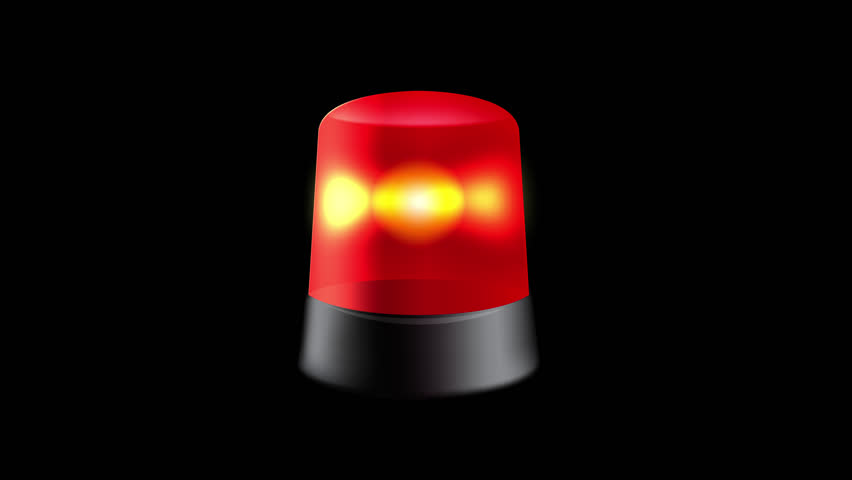 An emergency siren light spinning and flashing red alarm lights.