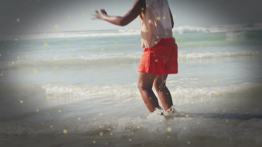 Girl foot hitting surf, jumping, splashing as watching sea, bubble overlay around girl marketing. Child, campaign, lifestyle, photorealistic, kidswear, beach, outdoors