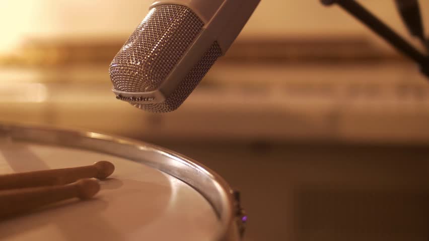 Macro View of Microphone Recording Drums Professional Music Studio Drum Recording Sound Capture Percussion Audio Engineering Equipment Close Up Production Session 4K Video