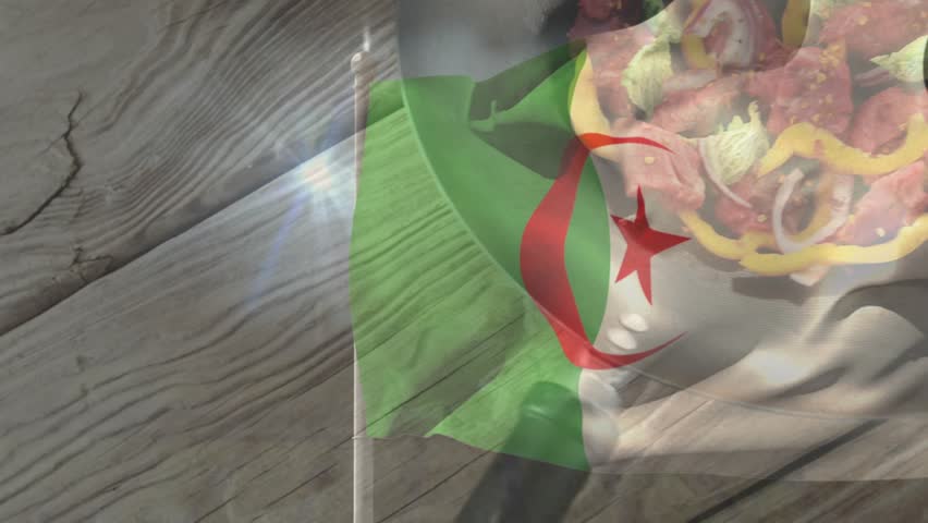 Algerian flag overlay appearing, hand placing spreading peppers onions meat into pan for recipe. Flatlay, overhead, kitchen, cooking, cookware, vegetables, colorful