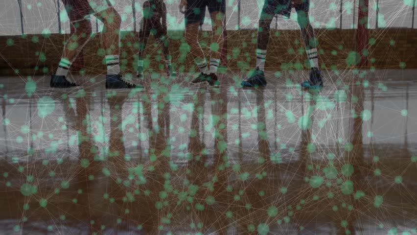Vertical video: Ref tossing ball, opponents jumping and tipping ball to hoop to gain control. Basketball, court, gymnasium, official, reflections, overlay, wooden