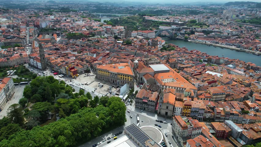 Aerial panorama view of the old town and center of the city Porto, in Portugal,   on a sunny noon in summer, beside the Douro river.