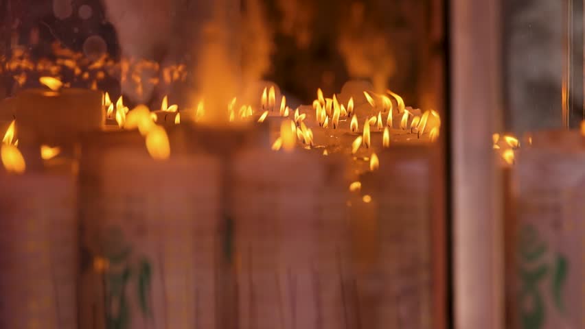 Jogyesa Temple Seoul Korea prayer candles flame spiritual atmosphere scene