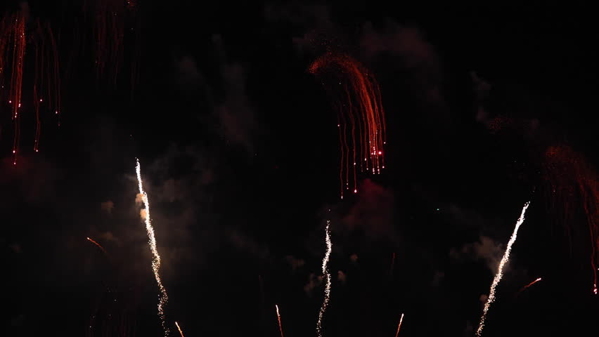 Amazing real beautiful colorful fireworks background on celebration night event for happy new year party, independence day, festivals, Abstract Multi color golden firework in the night sky