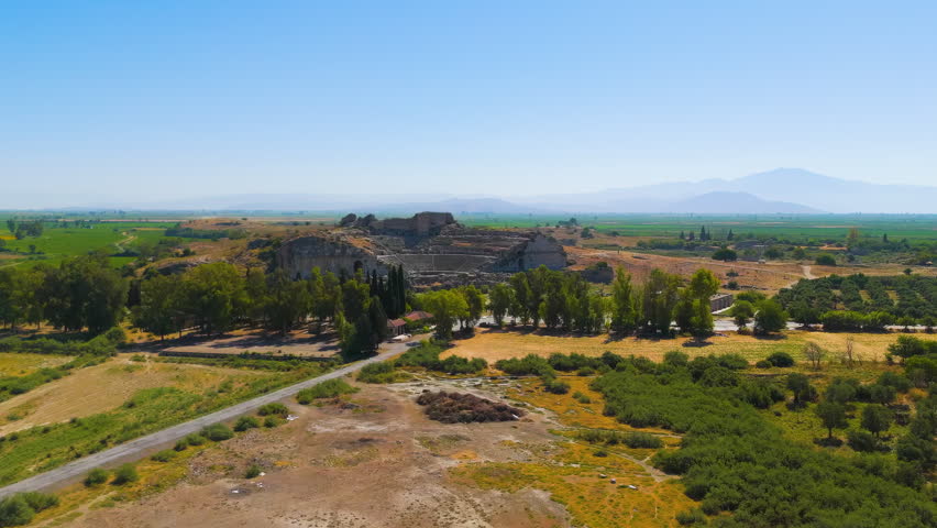 Balat, Turkey. Aerial drone view of the ancient Theatre of Miletus and Ilyas Bey Kervansarayi, archaeological site in Turkey. Stable. Aerial View. Rich colors