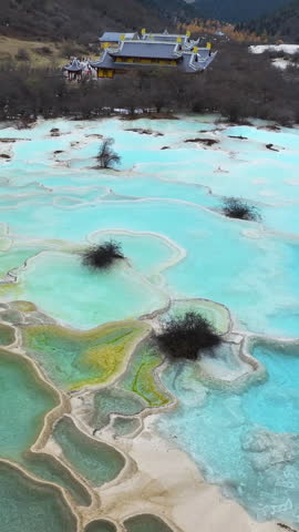 Aerial view of Huanglong national park, China. Vertical