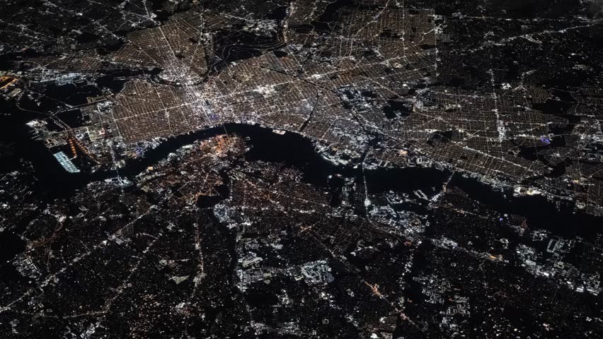Flying over Philadelphia city at night with urban lights satellite view from space based on Nasa imagery