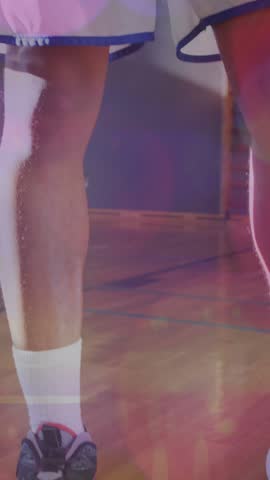 Neon basketball court layout against african american male basketball player practicing basketball. sports and fitness concept