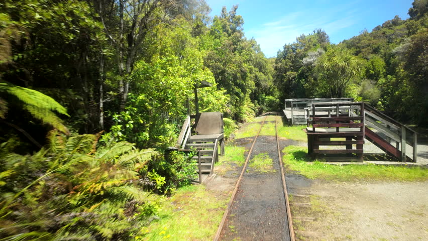 Scenic Railway Ride Past Forest Platform