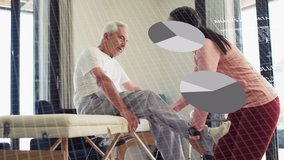 Therapist leaning holding patient leg on table, guiding ROM while rehab charts overlaying tracking. Mobility, rehabilitation, therapy, senior, clinical, daylight, teamwork - Powered by Shutterstock - Get 15% off with code: PIKWIZARD15