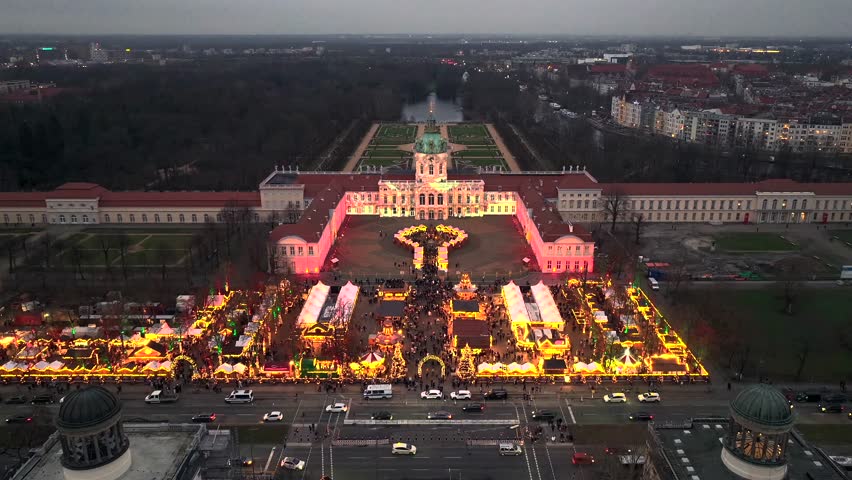 Weihnachtsmarkt Aerial View at Winter Night. Illuminated Christmas market at Charlottenburg Palace in Berlin, Germany