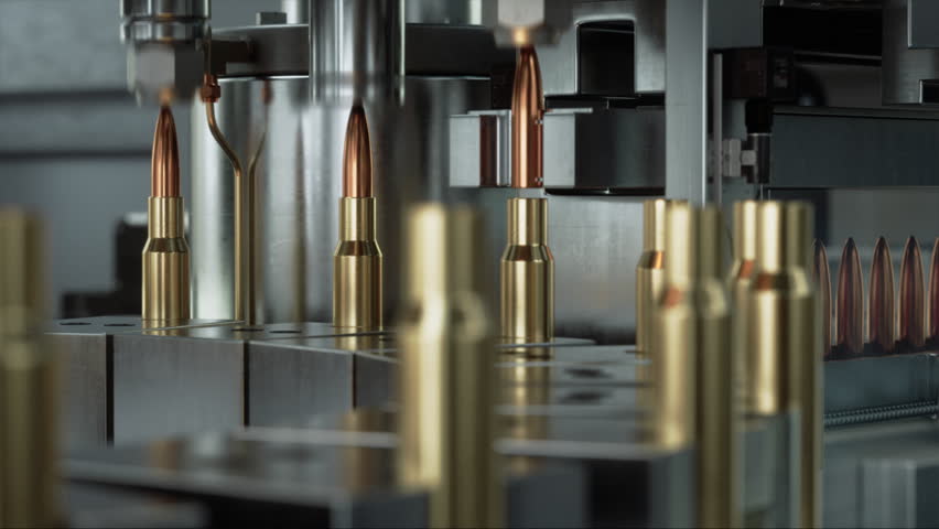 Bullet Manufacturing Machinery Operates on a Conveyor in Secure Factory, Assembling Ammunition Rounds With Precision Automation for Military, Army, Defense Production. Looped Time-lapse Static