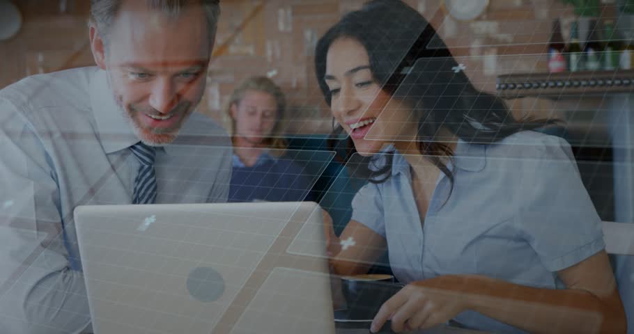 Woman pointing at laptop causing blue HUD charts while man typing, analyzing for data analytics. Collaboration, teamwork, graphs, globe, coworking, workspace, modern