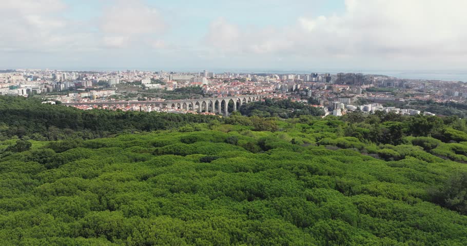 Monsanto Portugal historic Lisbon facing towards aqueduct and forest landscape aerial