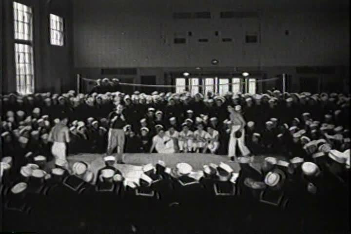 1940s - Navy sailors watch a boxing match in 1941.
