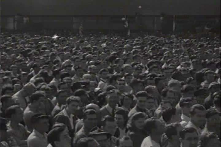 1940s - Thousands and thousands of workers outside an American factory in 1942.