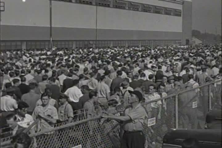 1940s - Thousands and thousands of workers outside an American factory in 1942.