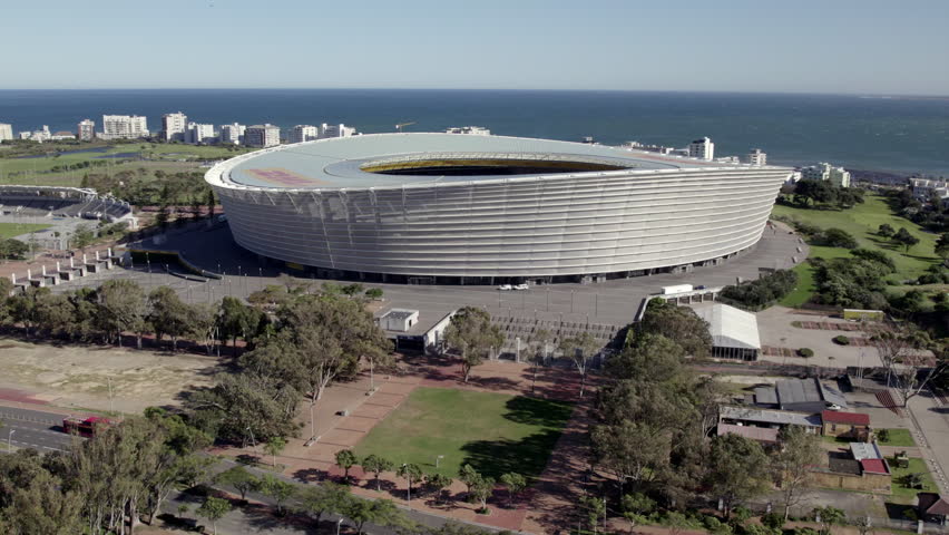 Aerial Drone Shot of Cape Town Soccer Stadium Downtown, Urban Skyline and Atlantic Seaboard in Cape Town South Africa