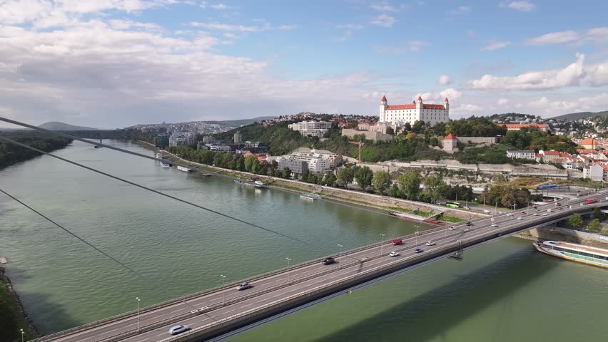 Drone shot of bridge over Danube river in Bratislava.