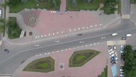 Drone Ascending Rotating above City Square
