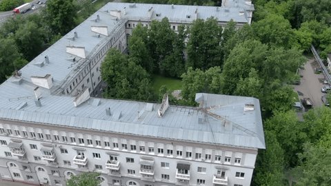 Aerial Orbit around Green Courtyard Buildings