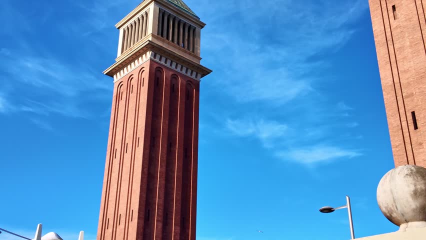 The red brick Venetian Towers as one pair exterior of towers in Barcelona city, Catalonia, Spain