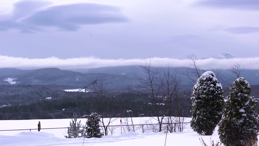 Snowy mountain landscape with trees