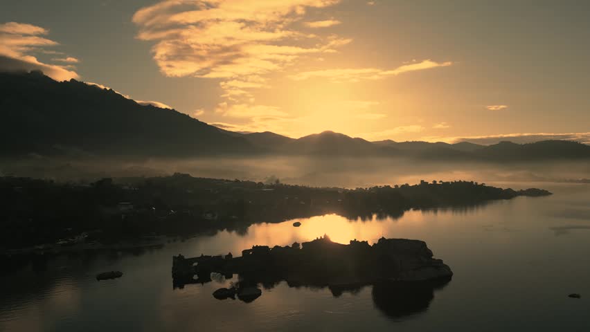 Breathtaking Aerial View of Bafa Lake at Sunrise with Fog and Ancient Ruins, Turkey