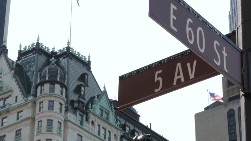 New York City Manhattan Midtown, United States. Old historic hotel building 1907 on Grand Army Plaza, 5 fifth avenue sign near Central Park. Classic iconic american architecture. Pulitzer Plaza in NYC