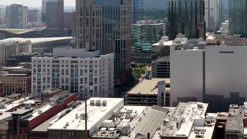 Aerial view of buildings and skyscrapers creating a dense urban landscape, showcasing the architectural diversity, Nashville, Tennessee, United States.